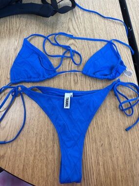 triangl swimwear blue quilted triangle string bikini